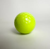 neon yellow glow golf ball